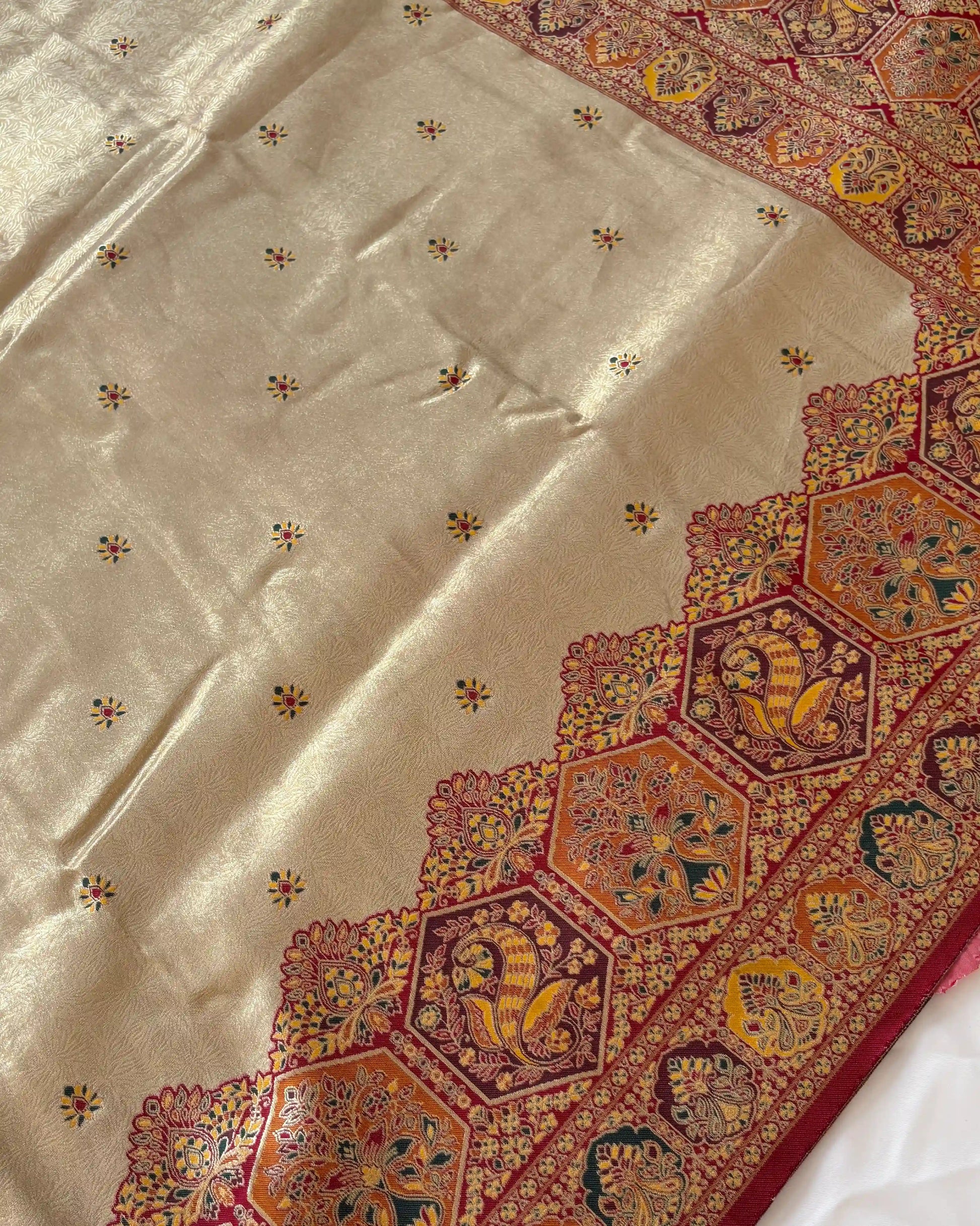 Decorative fabric with intricate patterns on a white background