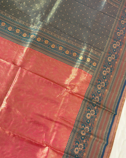 Sari with pink and blue border featuring floral patterns