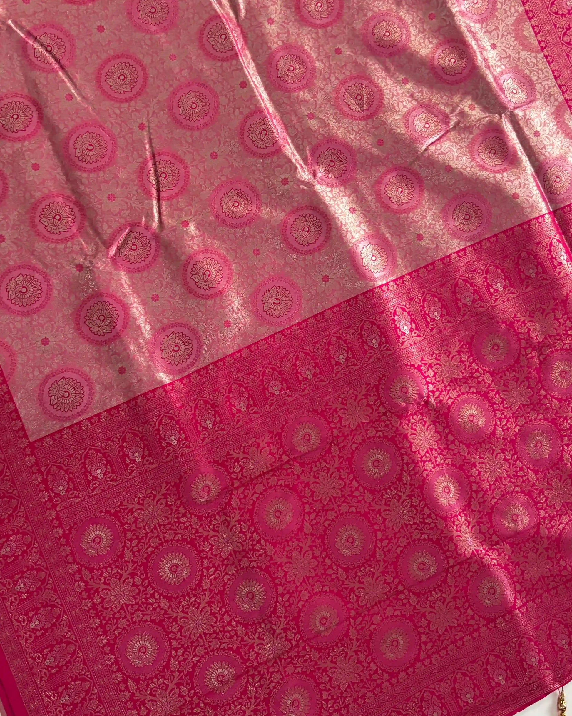 Pink fabric with circular patterns