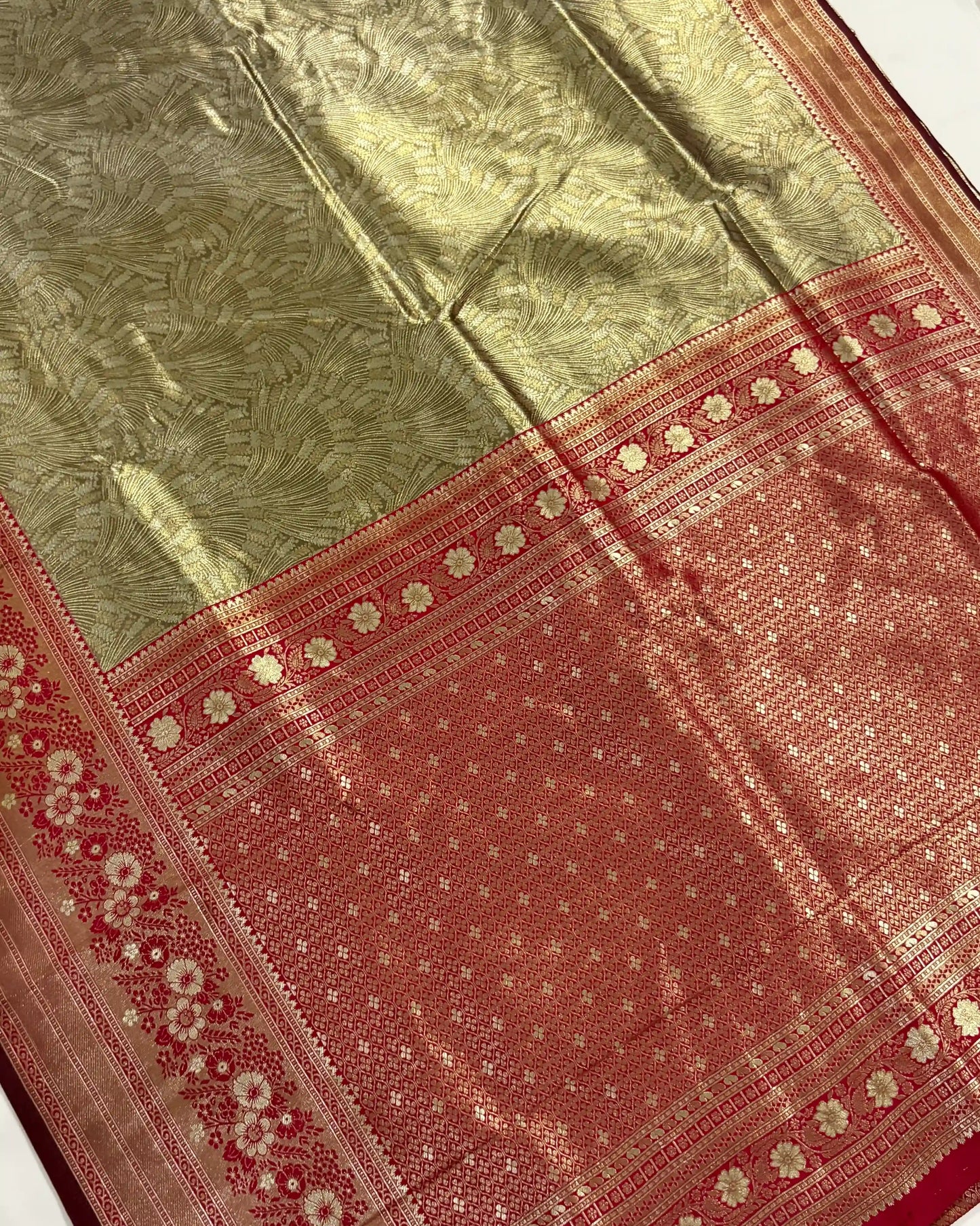 Traditional saree with green and red patterns